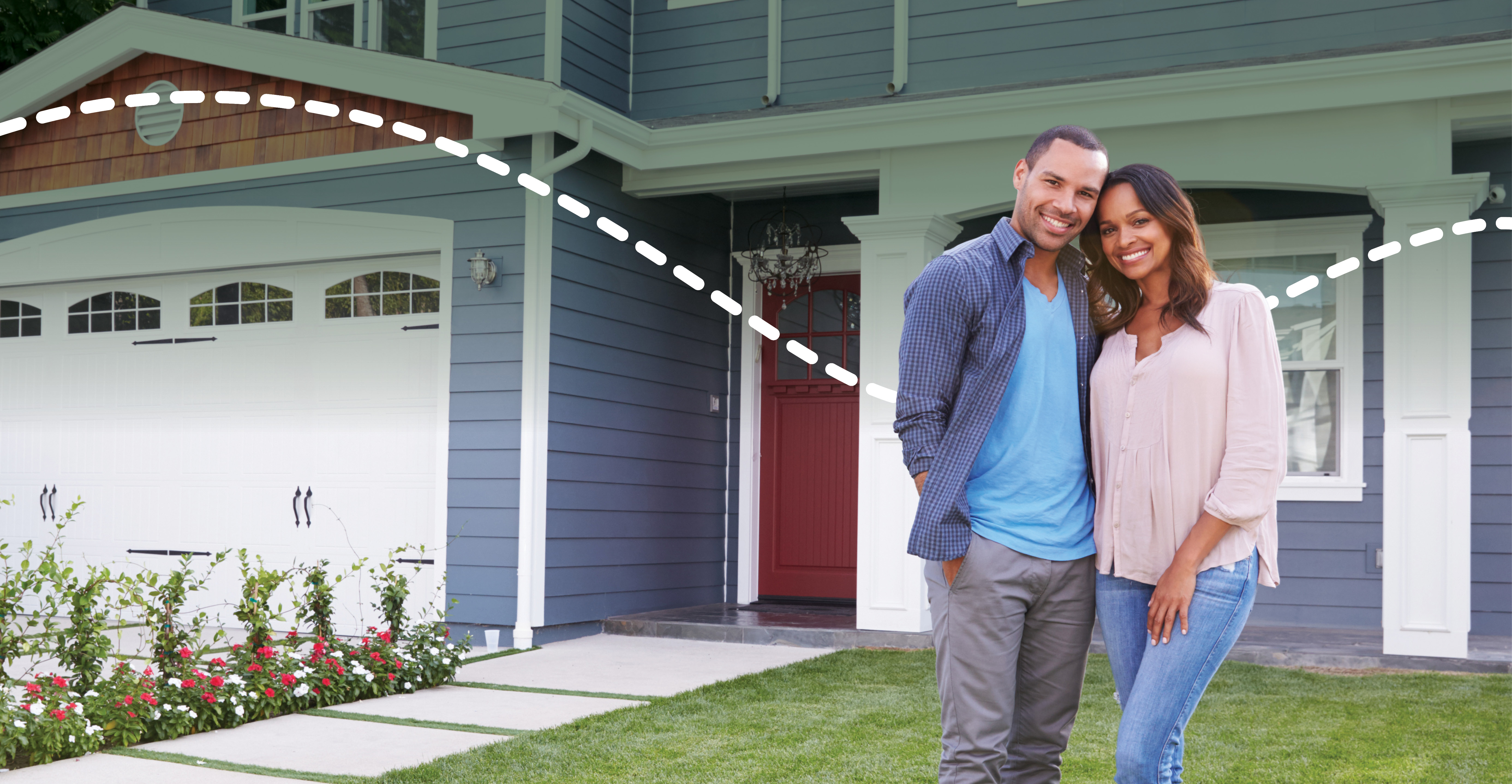 couple in front of house