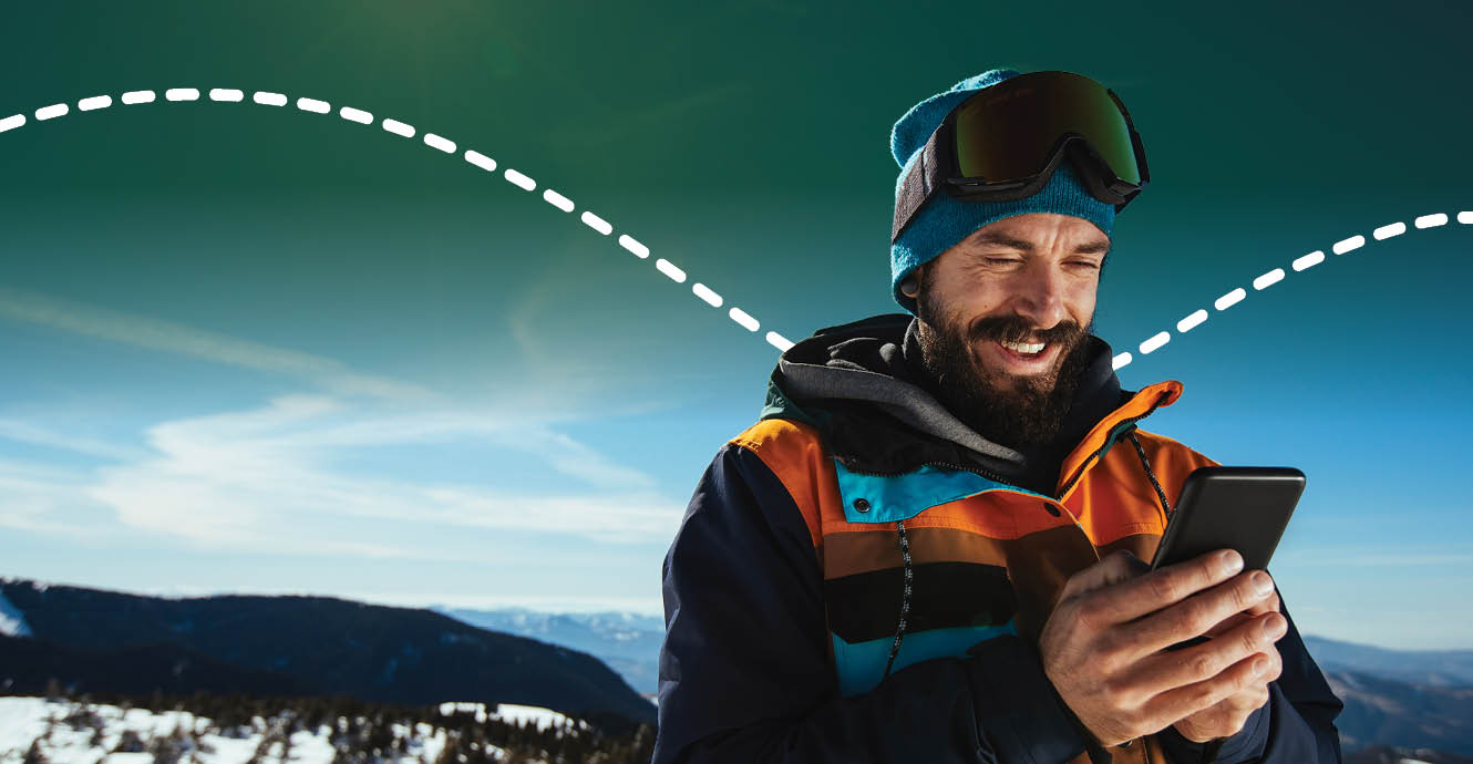 snowboarder using mobile banking